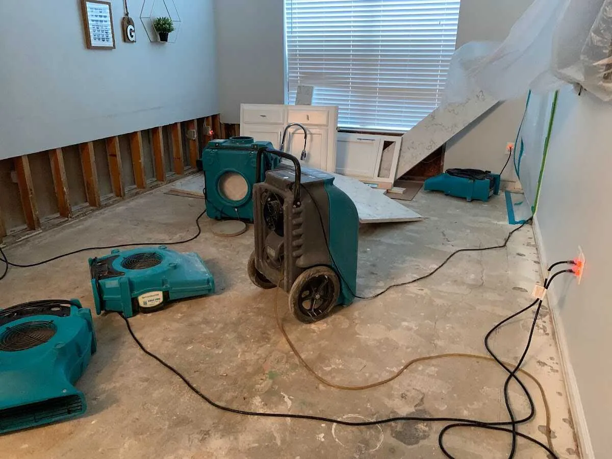 Dehumidifier in flood-cut room for Water Damage Restoration in Coral Hills